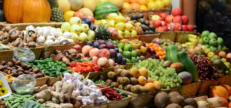 Fruit market with various colorful fresh fruits and vegetables - Market series