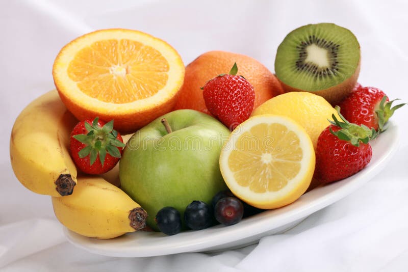 Plate with fruits like oranges, apples, bananas and strawberries. Plate with fruits like oranges, apples, bananas and strawberries