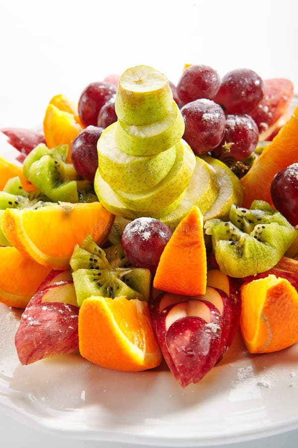 Fruit Plate with Orange Wedges, Apple, Grapes, Kiwi and Pear Stock