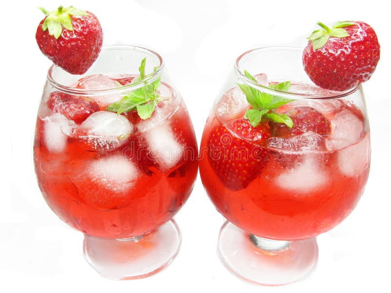 Fruit punch cocktails with ice and strawberry