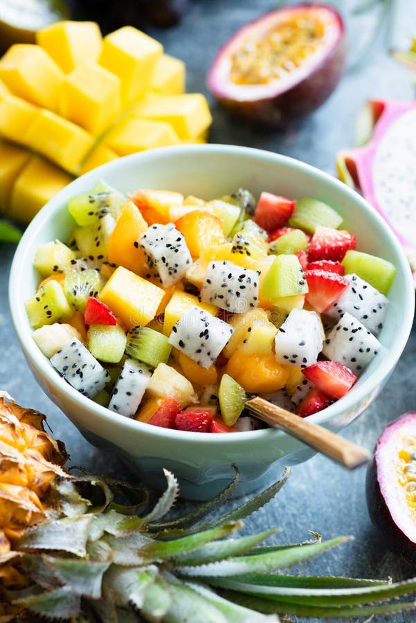 Fruit salad bowl with tropical fruits