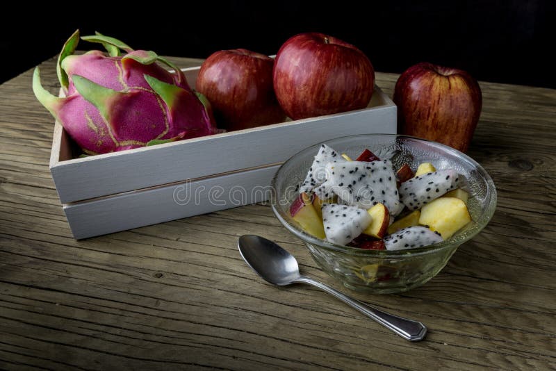 Fruit salad in a bowl on the wooden table. Selective focus. royalty free stock photo