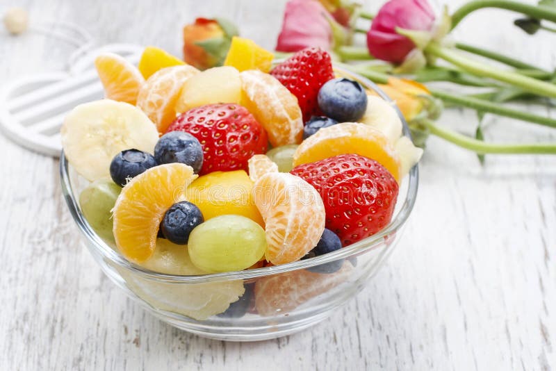 Fruit salad in glass bowl stock photo. Image of colorful 48887162