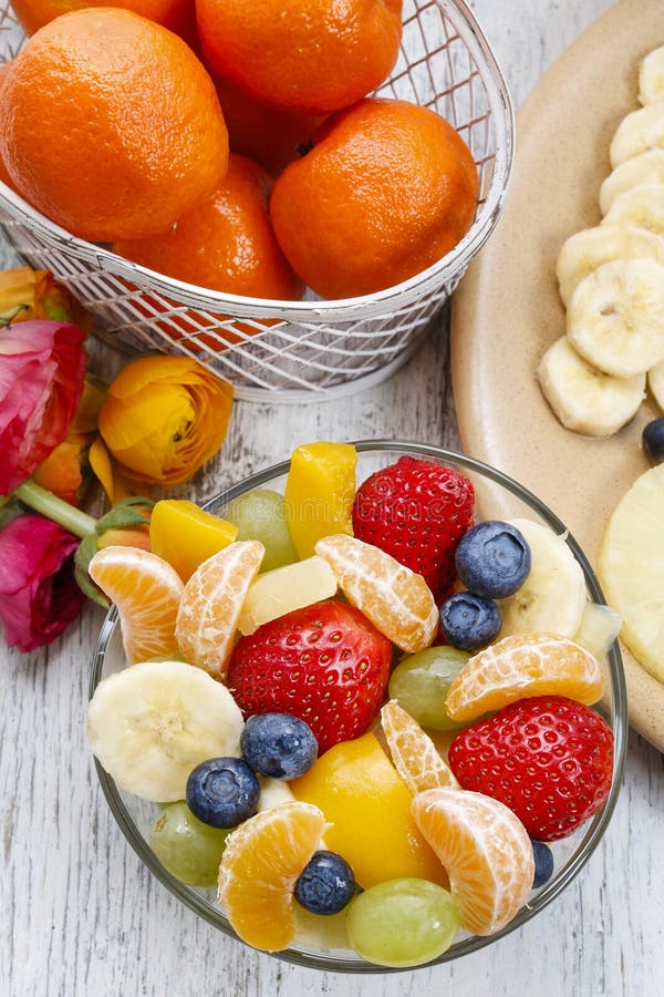 Fruit salad in glass bowl stock photo. Image of orange 48446892