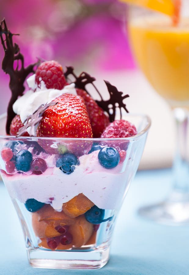 Fruit salad with ice cream stock photo. Image of gourmet 55590046