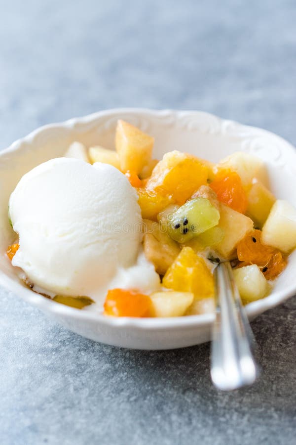 Fruit Salad with Vanilla Ice Cream in Ceramic Bowl Stock Photo Image