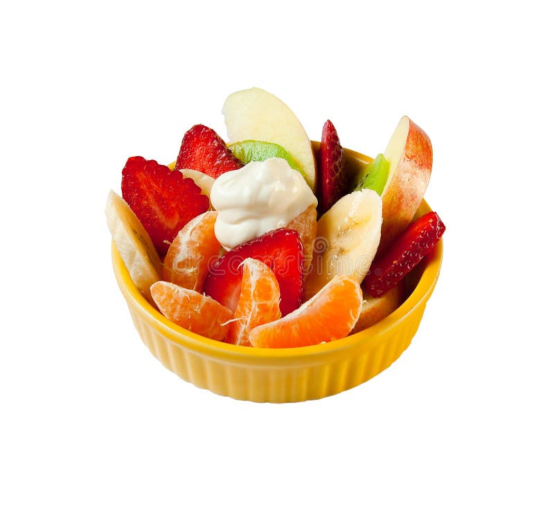 Fruit salad with yogurt in a yellow plate