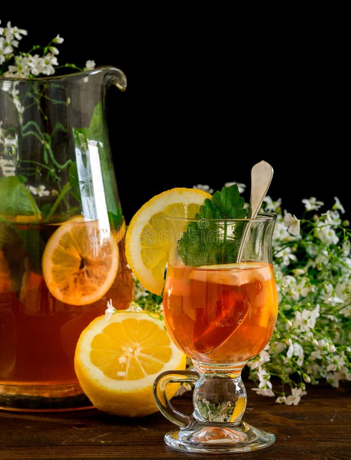 Fruit tea with lemon stock image. Image of flowers, cold - 40879921