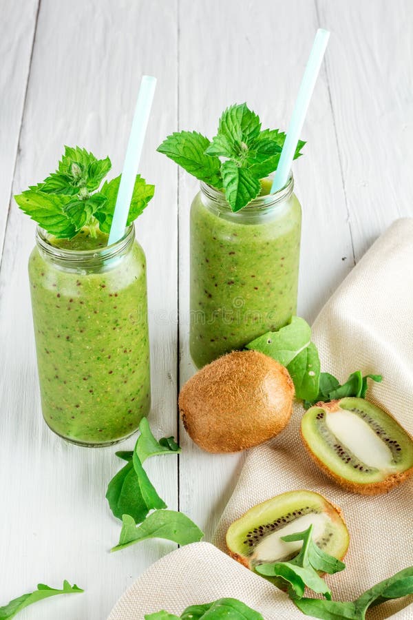 Fruit and vegetable smoothies out of kiwi, arugula royalty free stock images Fruit and vegetable smoothies out of kiwi, arugula royalty free stock images