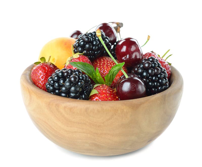 Fruit in wooden bowl stock image. Image of natural, lots 31339099