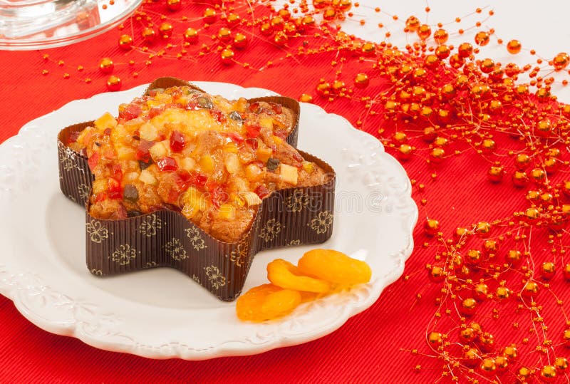 Fruitcake with candied fruits on Christmas background royalty free stock photo Fruitcake with candied fruits on Christmas background royalty free stock photo