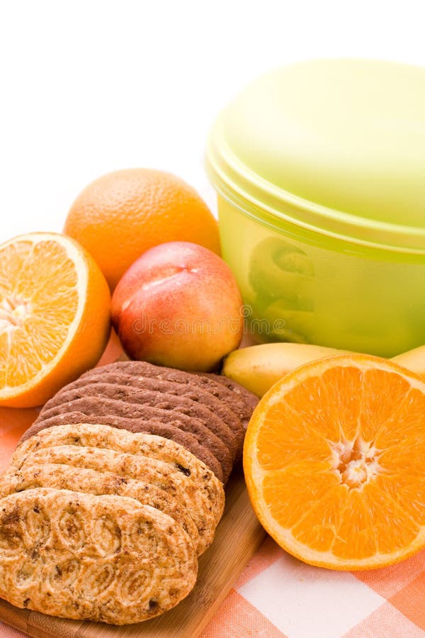 Fruits and cookies stock photos