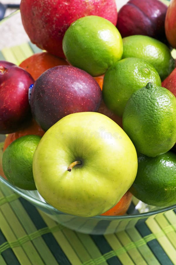 Fruits in a Glass Bowl stock photo. Image of plum, apple 28667278