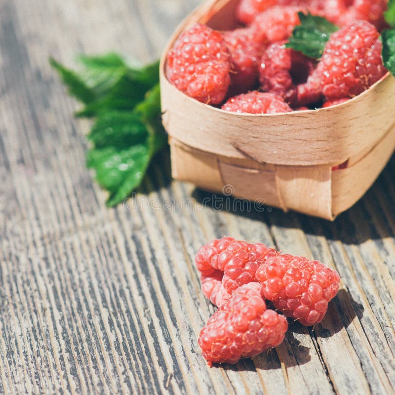 Tasty summer fruits on a wooden table. Outdoor. Tasty summer fruits on a wooden table. Outdoor