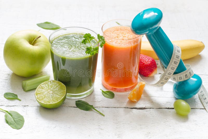 Fruits, vegetables, juice, smoothie and dumbell health diet and fitness royalty free stock photos Fruits, vegetables, juice, smoothie and dumbell health diet and fitness royalty free stock photos