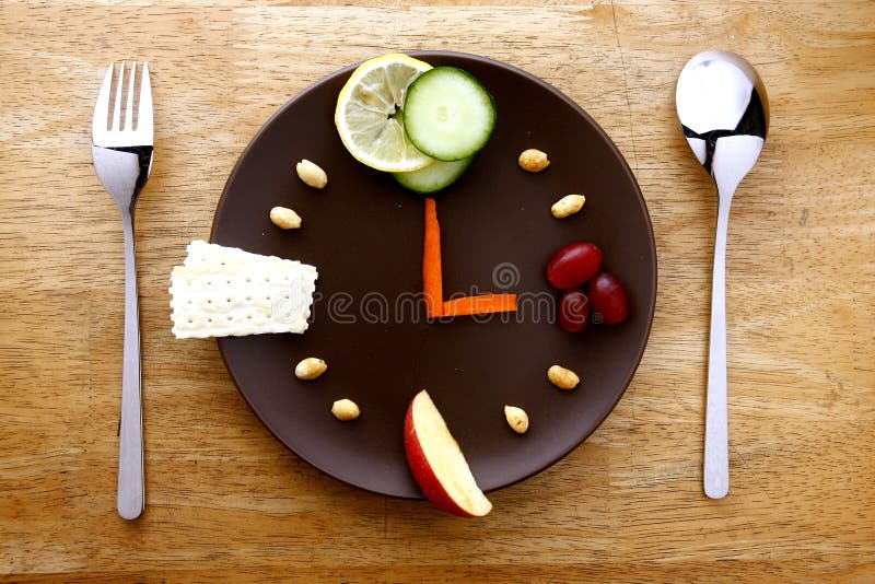 Fruits, vegetables, nuts and crackers on a plate