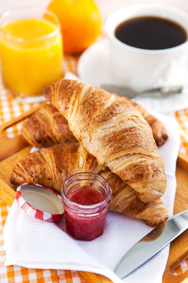 Frukostera med giffel, koppen kaffe och orange fruktsaft royaltyfri fotografi Frukostera med giffel, koppen kaffe och orange fruktsaft royaltyfri fotografi