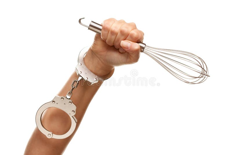 Handcuffed Woman Holding Egg Beater in the Air Isolated on a White Background. Handcuffed Woman Holding Egg Beater in the Air Isolated on a White Background.