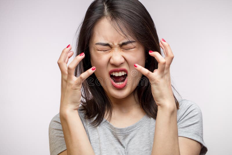 Frustrated Angry Asian Woman Isolated Over White Background