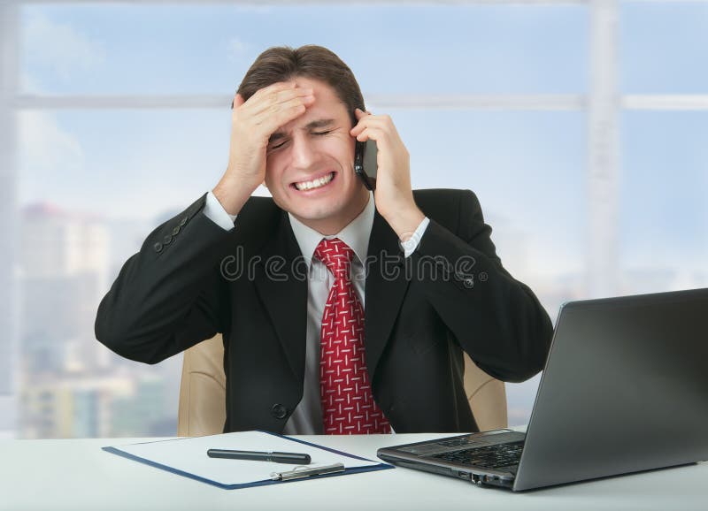 Frustrated business man talking on phone