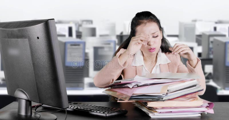 Frustrated business woman searching document