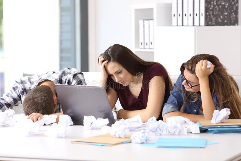 Frustrated entrepreneurs surrendering at office royalty free stock photo