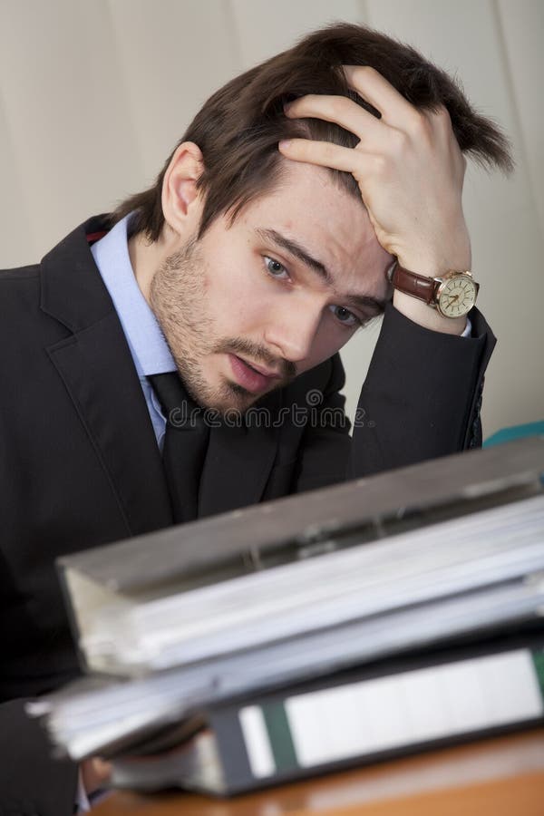 Frustrated man with folders