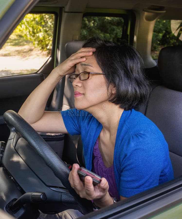 Frustrated Woman in Car in Traffic Jam stock photo Frustrated Woman in Car in Traffic Jam stock photo