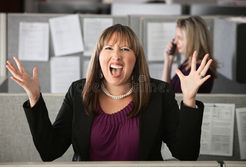 Frustrated woman office worker screaming with hands in air. Frustrated woman office worker screaming with hands in air