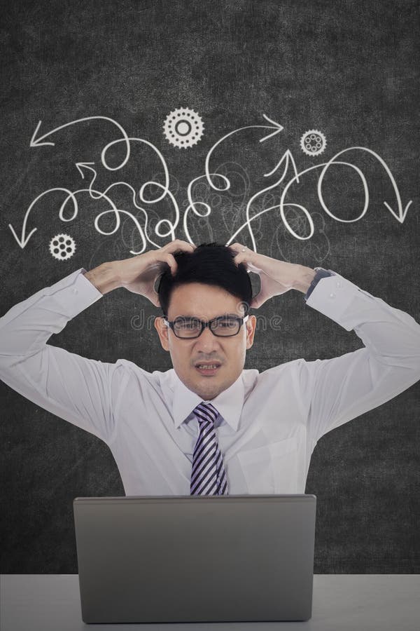 Frustrated worker scratching head royalty free stock images Frustrated worker scratching head royalty free stock images