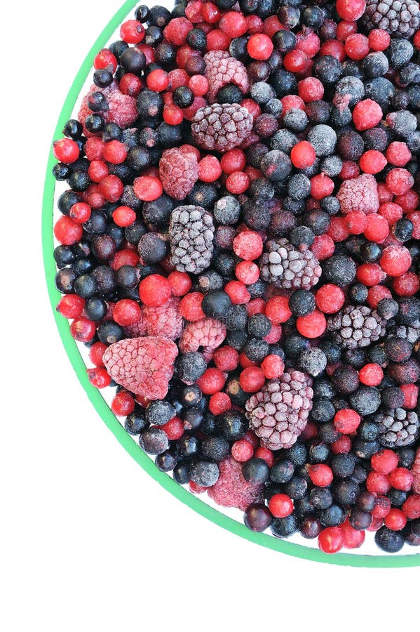 Fruta mezclada congelada en el tazón de fuente - bayas fotografía de archivo Fruta mezclada congelada en el tazón de fuente - bayas fotografía de archivo