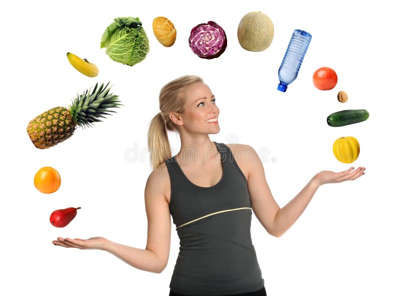 Frutas e legumes de mnanipulação da jovem mulher imagem de stock Frutas e legumes de mnanipulação da jovem mulher imagem de stock