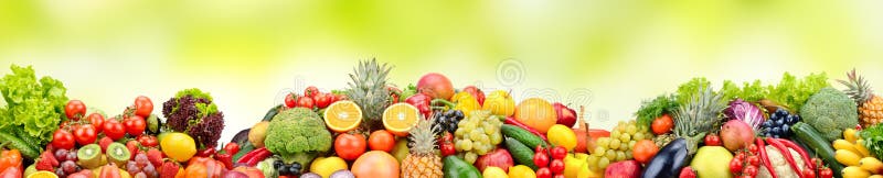 Composition variety fresh fruits and vegetables on green background. Glass skinali. Composition variety fresh fruits and vegetables on green background. Glass skinali