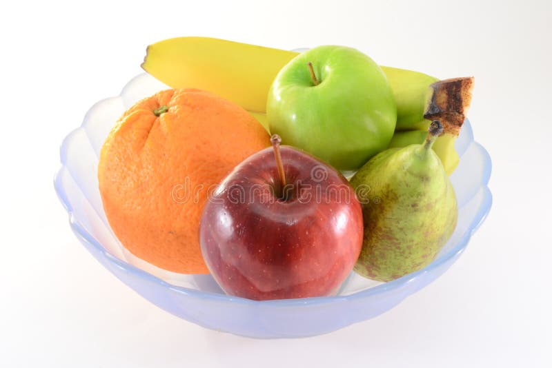 Fresh fruits in a bowl, isolated on white. Fresh fruits in a bowl, isolated on white.