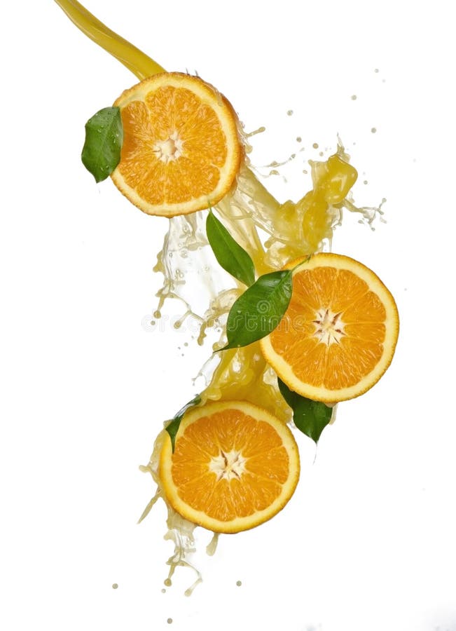 Frutas y jugo anaranjados el salpicar foto de archivo libre de regalías Frutas y jugo anaranjados el salpicar foto de archivo libre de regalías
