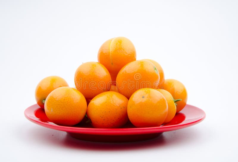 Frutti Poco Arancio E Pomodori Ciliegia Fotografia Stock Immagine di