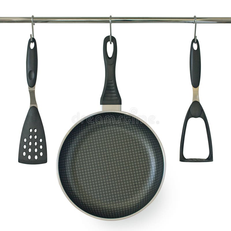 Fry Pan and Kitchen Utensils Hanging on a Rail Stock Image Image of