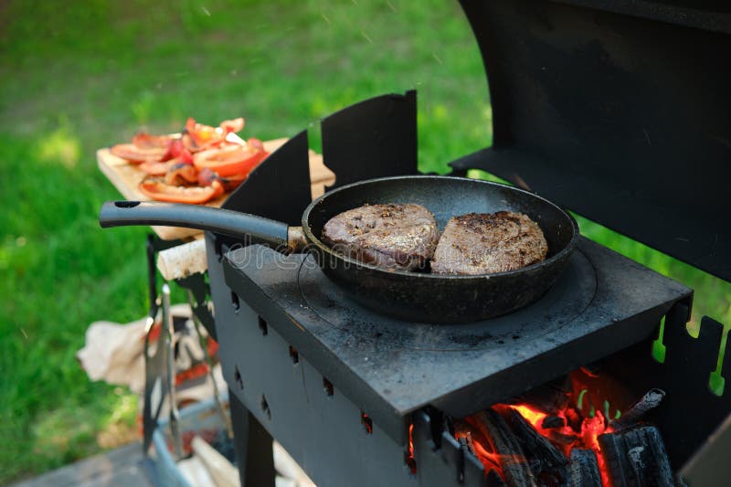 Frying Beef Steak in a Pan on Outdoor Grill Stock Image Image of