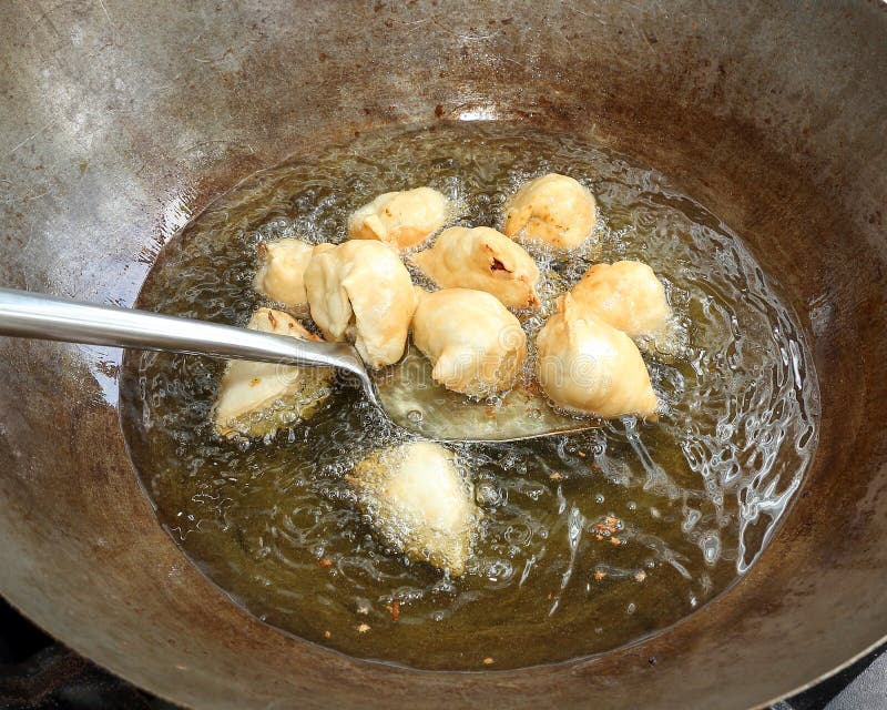 Frying cooking samosa stock image. Image of spicy, boiling 73399127