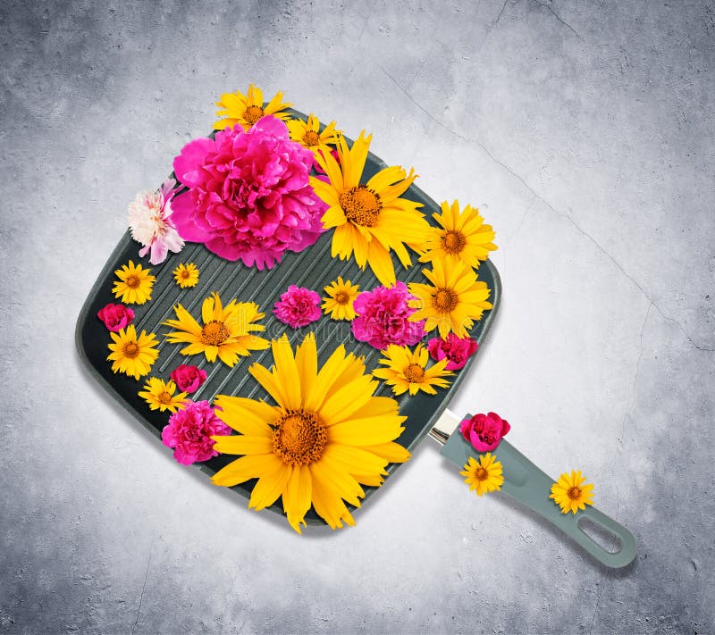 Frying pan with flowers stock photo. Image of cooking 68966958