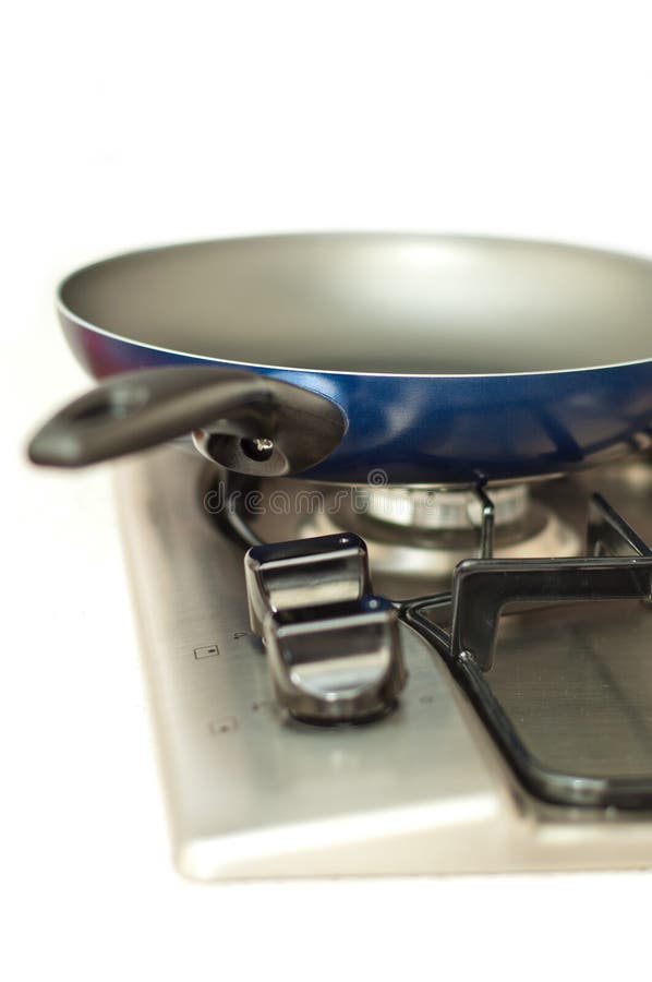 Frying pan on a stove stock image. Image of frypan, white 22599021