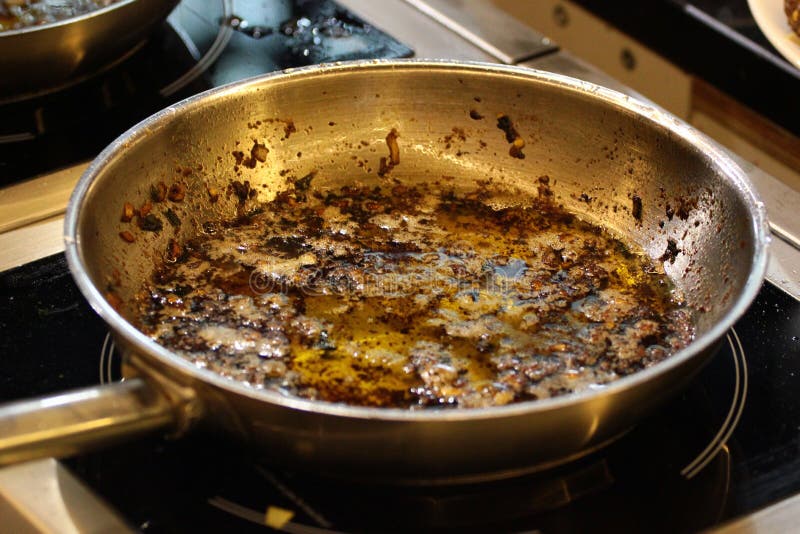 Frying Pan With Used Oil On A Stove After Cooking Stock Photo Image