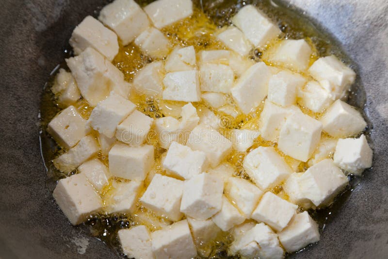 Frying paneer in ghee stock photo. Image of lemon, asian 73999518