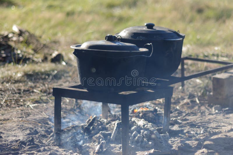 Pans in the fire stock photo. Image of fire, delicious 60636934