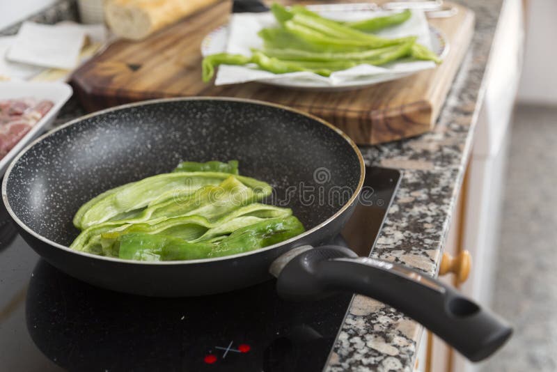 Frying Peppers in the Kitchen Stock Photo Image of tasty, dish 79395882