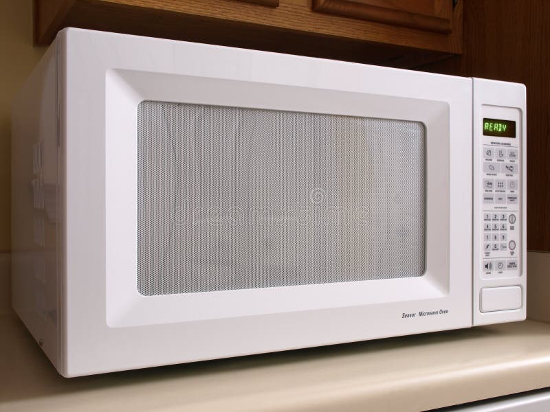White counter top Microwave oven front view. White counter top Microwave oven front view