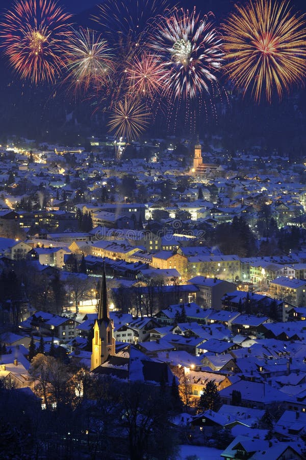 New year firework over famous town garmisch-partenkirchen in germany. New year firework over famous town garmisch-partenkirchen in germany