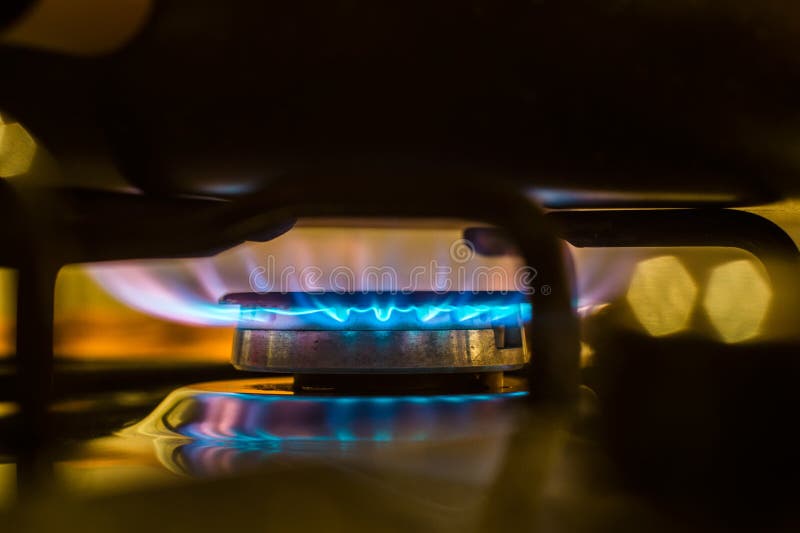 Fuego de la estufa de cocina del gas fotografía de archivo Fuego de la estufa de cocina del gas fotografía de archivo