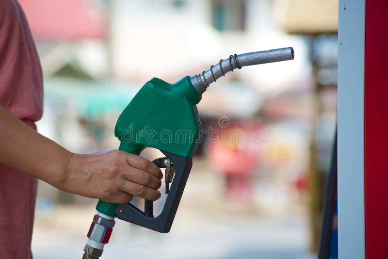 Fuel pipe in hand stock photo. Image of pollution, fuel 36489366