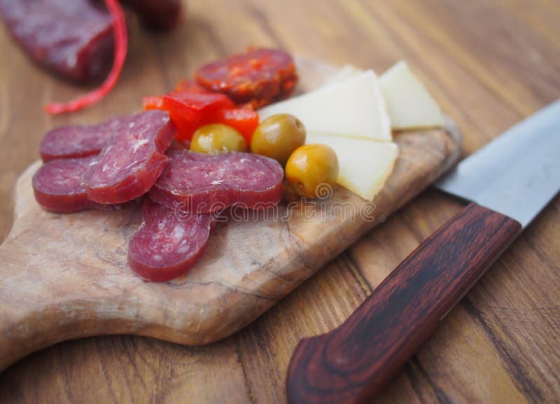 Fuet, a Traditional Spanish Sausage with Rosemary. Slice Sausages